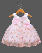Sleeveless party frock with flower appliques, sequin motifs, and flared tulle skirt