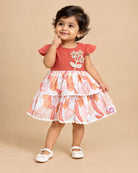 Little girl tiered printed casual frock with cap sleeves and floral crochet applique