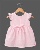 Infant textured floral casual frock with flutter sleeves and chest brooch detail