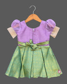 Pattu frock for girls with floral embroidered yoke, puff sleeves and zari border box-pleated skirt