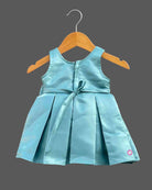 Sleeveless pleated silk frocks for baby girl with oversized waist bow and crystal belt detailing.