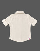 Collared button-down shirt with chest pocket embellishment featured in party wear for boys