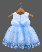 Girls embellished mesh frock with sequins, pearl brooch, floral waist appliqué, and layered net flare.