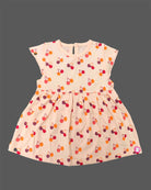 Infant cotton frock with short puff sleeves and printed pattern for casual outing