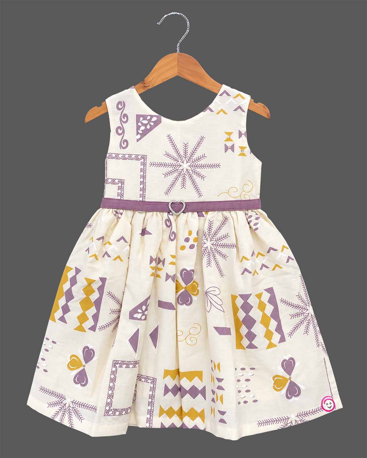 Little girl purple and off-white printed cotton casual frock with attached short sleeve jacket and floral brooch