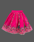 Detailed view of sleeveless embroidered lehenga choli for kids featuring scalloped floral hems.