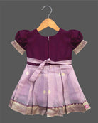 Charming ethnic pattu pavadai style cotton silk frock for baby girls with gold zari border and traditional motifs