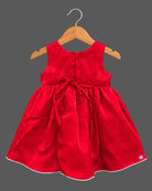 Sleeveless satin party frock with waist accents and kids party wear details.