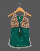 Sleeveless short kurti with attached embroidered jacket and pleated dhoti patiyala pants for kids[cite: 5].