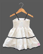 Baby Girl Tiered Frock with flower applique and zig-zag trim detailing for birthday Western wear.