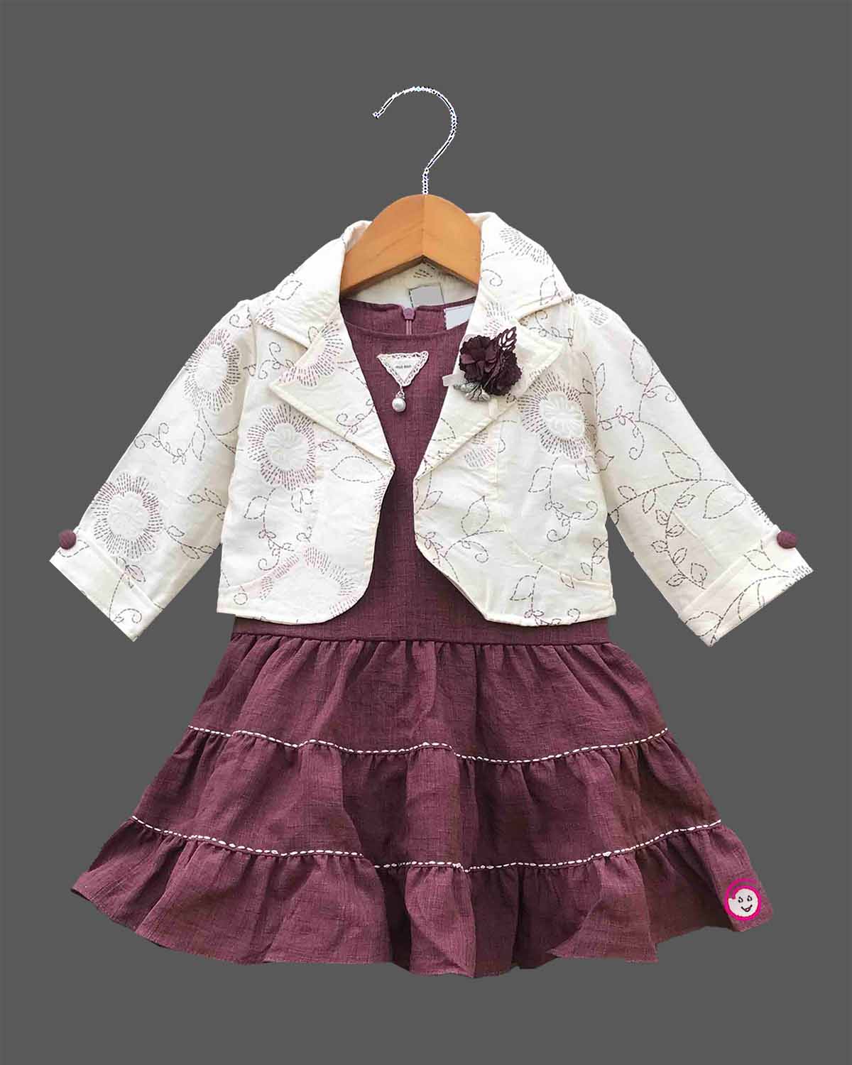 Little princess western layered frock set featuring a tiered dress with an embroidered crop jacket for celebrations.