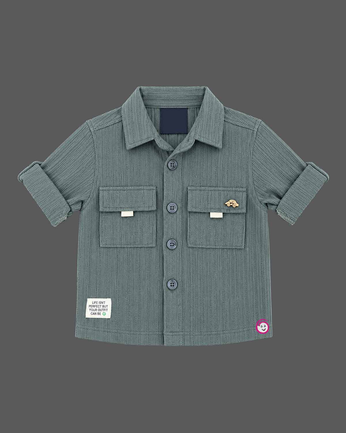 Boy wearing ribbed short sleeve button down shirt and matching cargo trousers party wear for boys