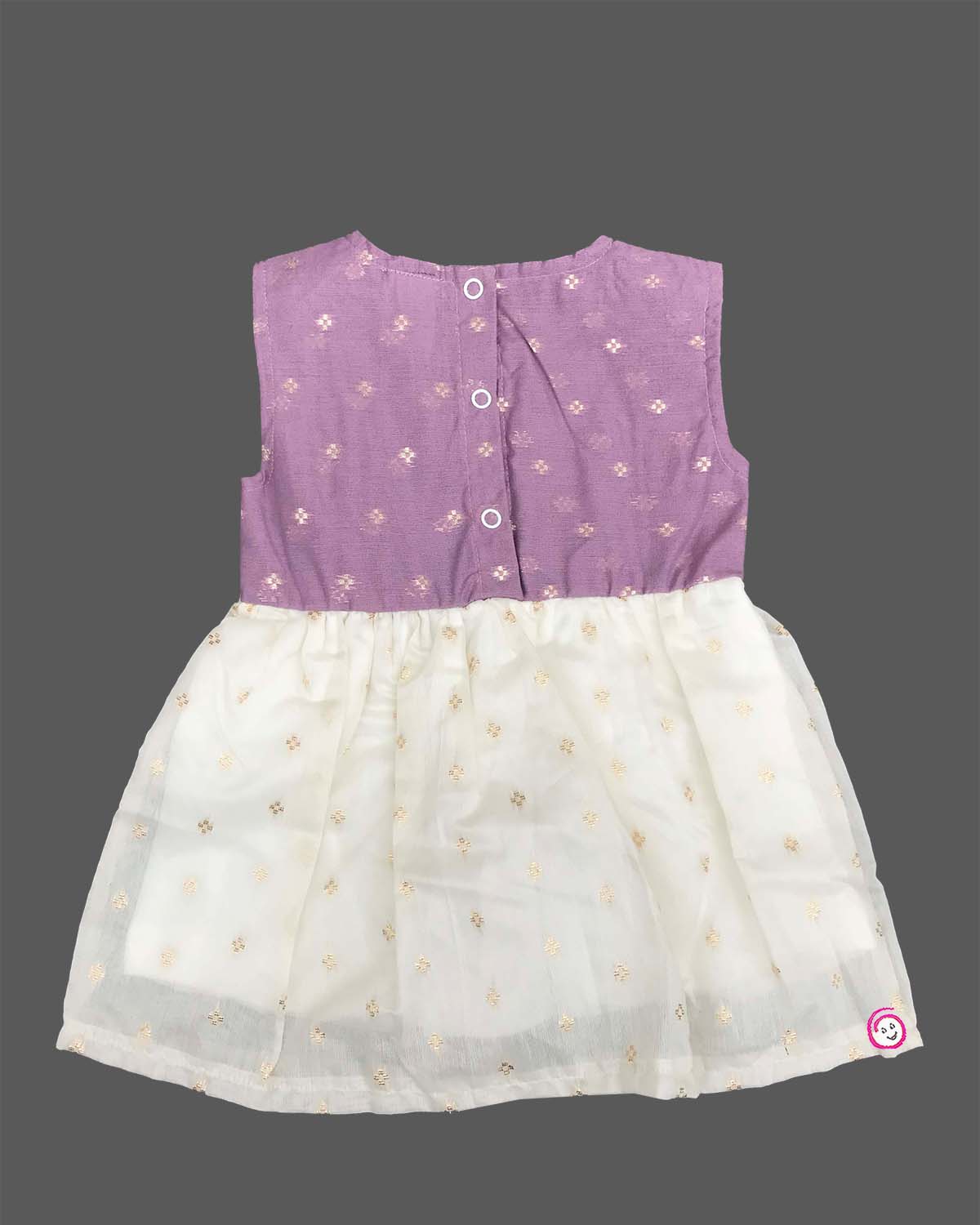 Sleeveless traditional attire for toddlers with small metallic woven patterns and a soft gathered waistline.