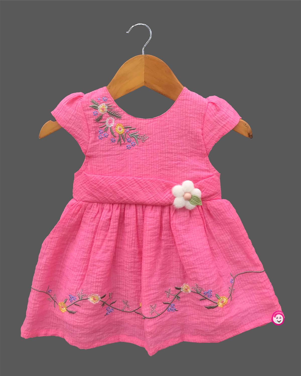 Little princess cotton casual frock featuring floral embroidery, cap sleeves, and decorative waist accent for everyday comfort