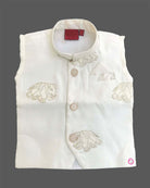 Boys off-white silk ethnic kurta jacket with gold elephant embroidery and mandarin collar paired with matching elastic waist dhoti pant