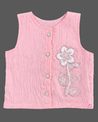 Sleeveless button-down top with floral applique and trousers set as a baby party wear dress.