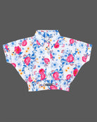 Floral shirt and buttoned wrap skort set styled as a baby party wear dress for girls