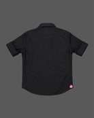 Front view of a designer collared party shirt for boys featuring intricate stud detailing across the yoke and roll-up sleeves.