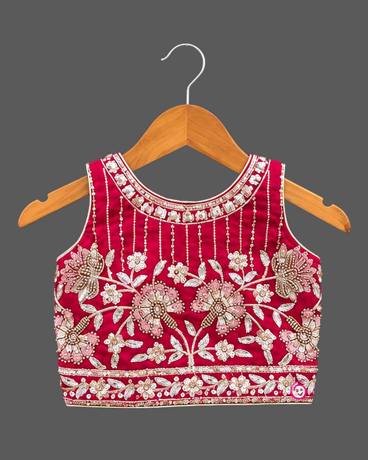 Lehenga choli for kids with beaded floral yoke, sleeveless round neck choli and pleated skirt with tassel tie