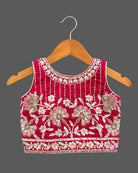 Lehenga choli for kids with beaded floral yoke, sleeveless round neck choli and pleated skirt with tassel tie