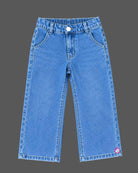 Ruffled top and denim pant baby party wear dress with embellished bow detail.