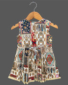 Toddler printed cotton frock with smocked neck and front lace tie ups for casual outing and birthday celebration