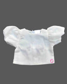 Toddler girl outfit set featuring textured puff sleeve blouse and denim pinafore dress with bunny patch detail and pleated skirt