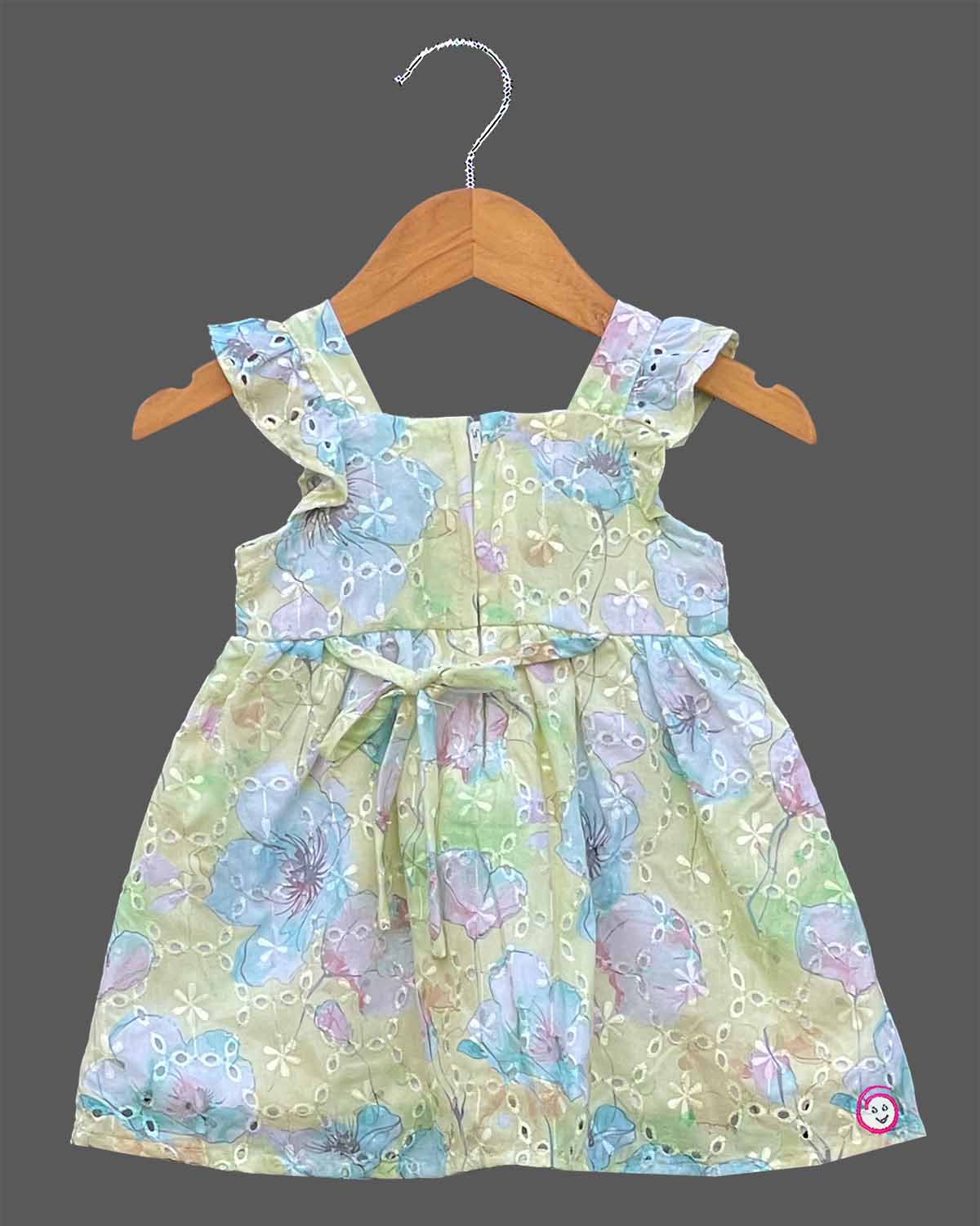 Pastel green schiffli floral casual frock for toddler girls with teddy patch