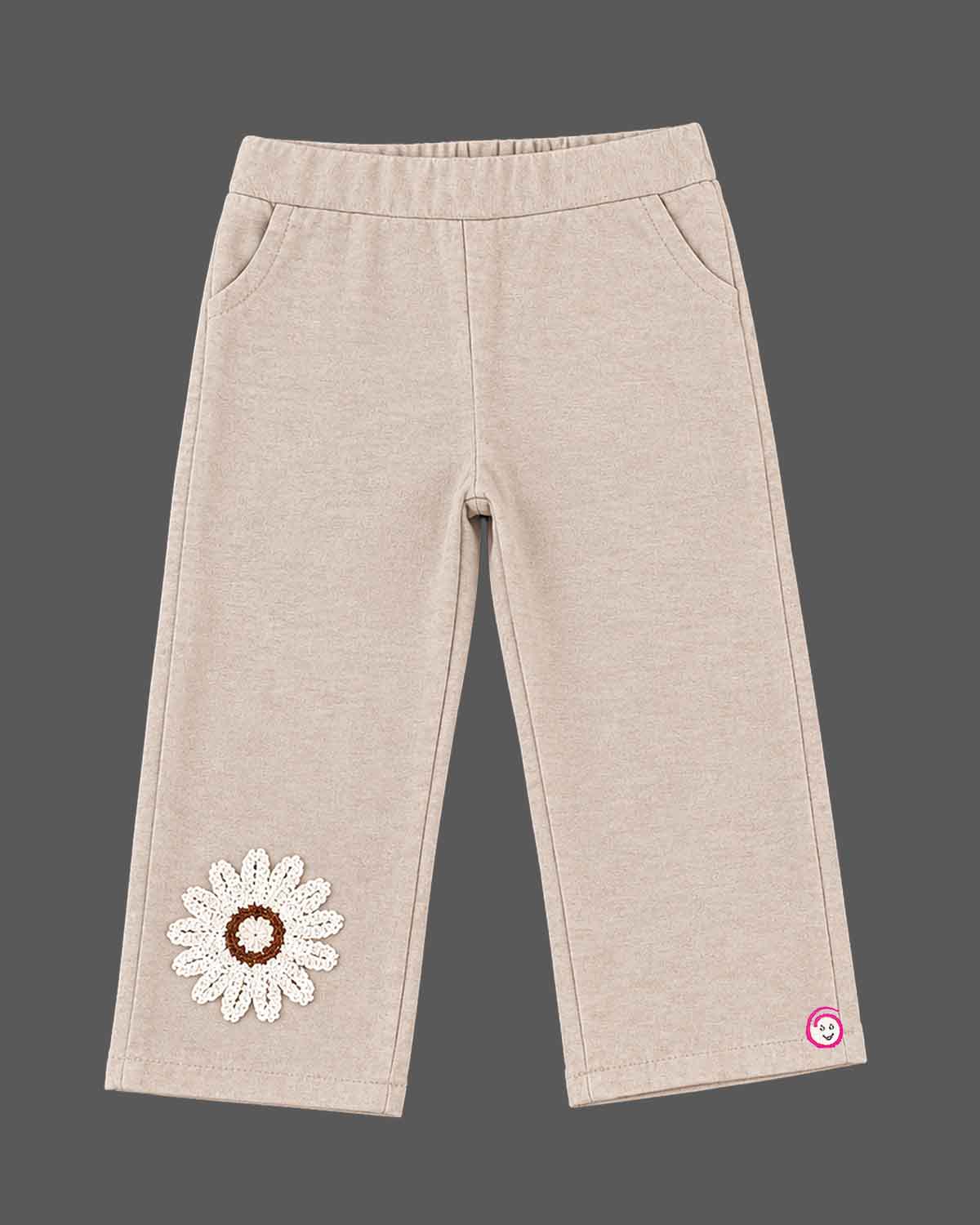 Kids party wear vest top and trouser set featuring crochet floral applique and back zipper closure.