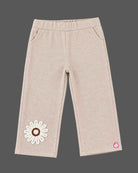 Kids party wear vest top and trouser set featuring crochet floral applique and back zipper closure.