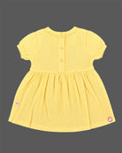 Infants frock in soft textured cotton fabric for casual playdates and baby clothes collection.