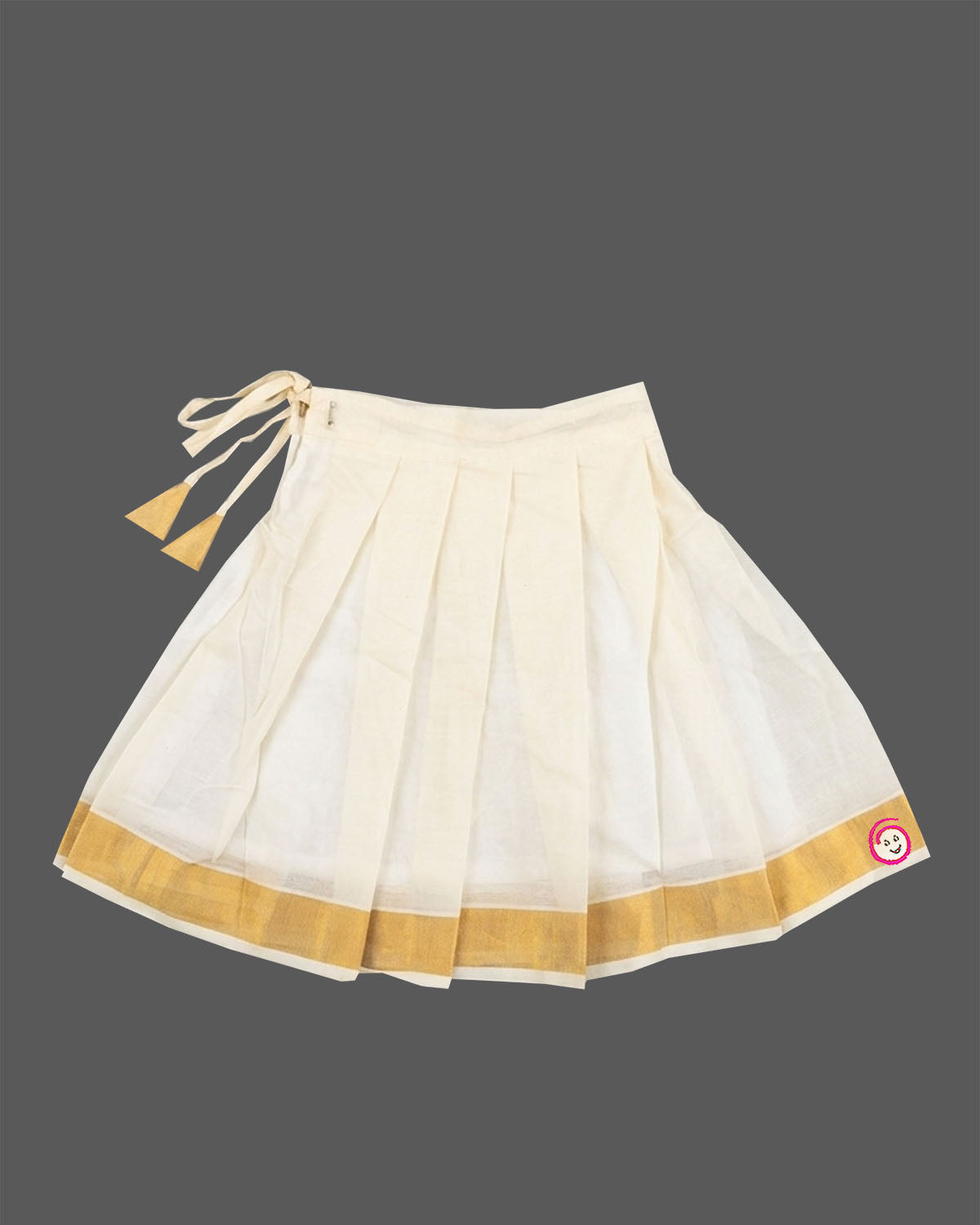 Little fashionista traditional two-piece festive choli set with woven zari borders and pleated ethnic skirt.
