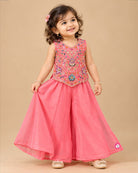 Kids sharara set featuring sleeveless hand-embroidered top, flared palazzo pants, and matching dupatta.