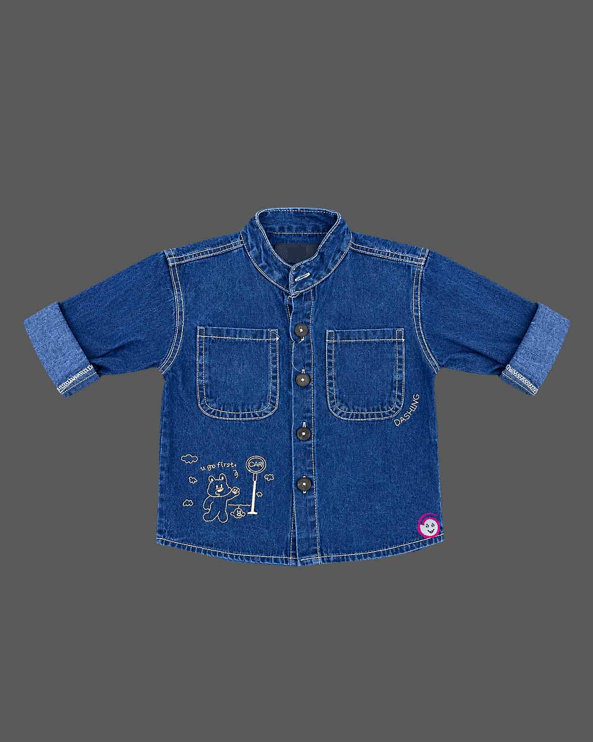 Detailed view of party wear for boys featuring denim button shirt with graphic prints and cargo Pant.