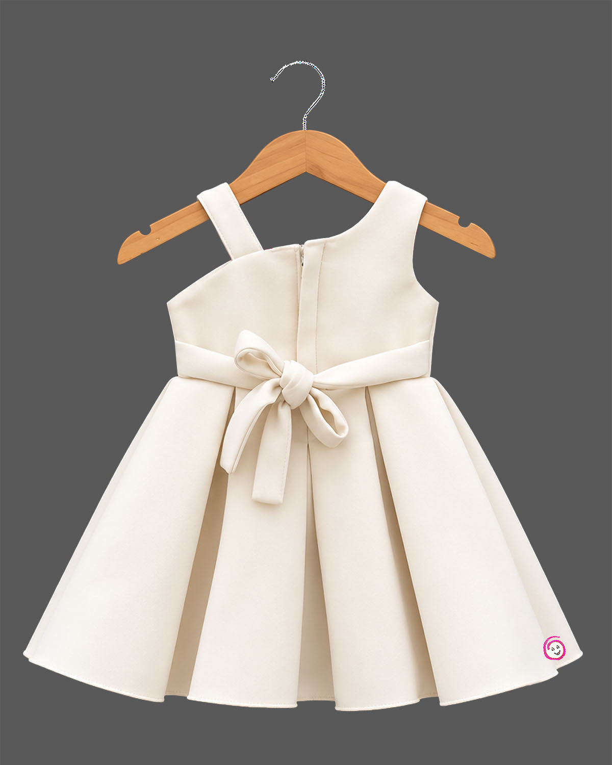 Girls one-shoulder box pleated party frock with 3D floral applique trim along neckline.