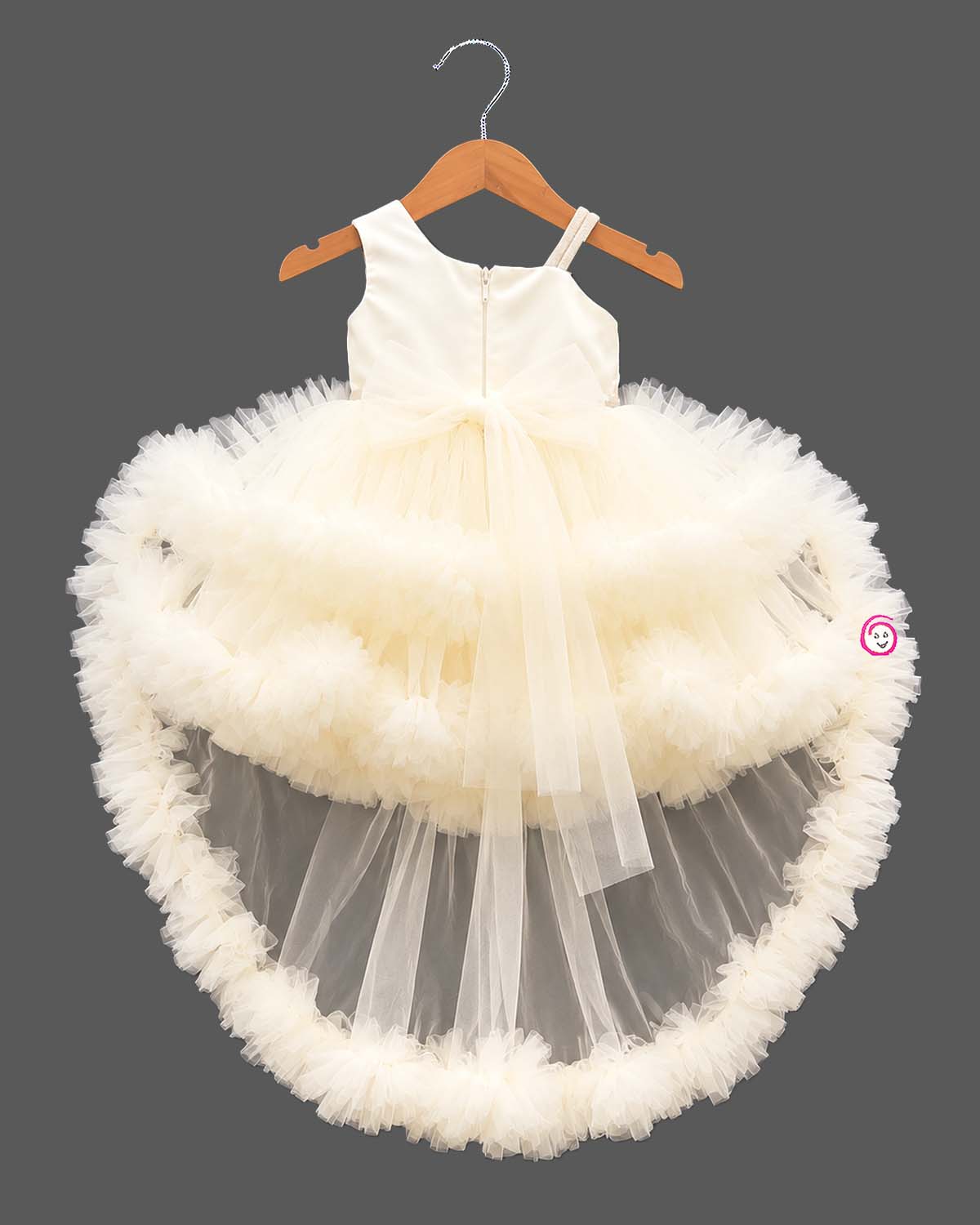 Embellished asymmetrical tulle silk frocks for baby girl featuring ruffled high-low hem.