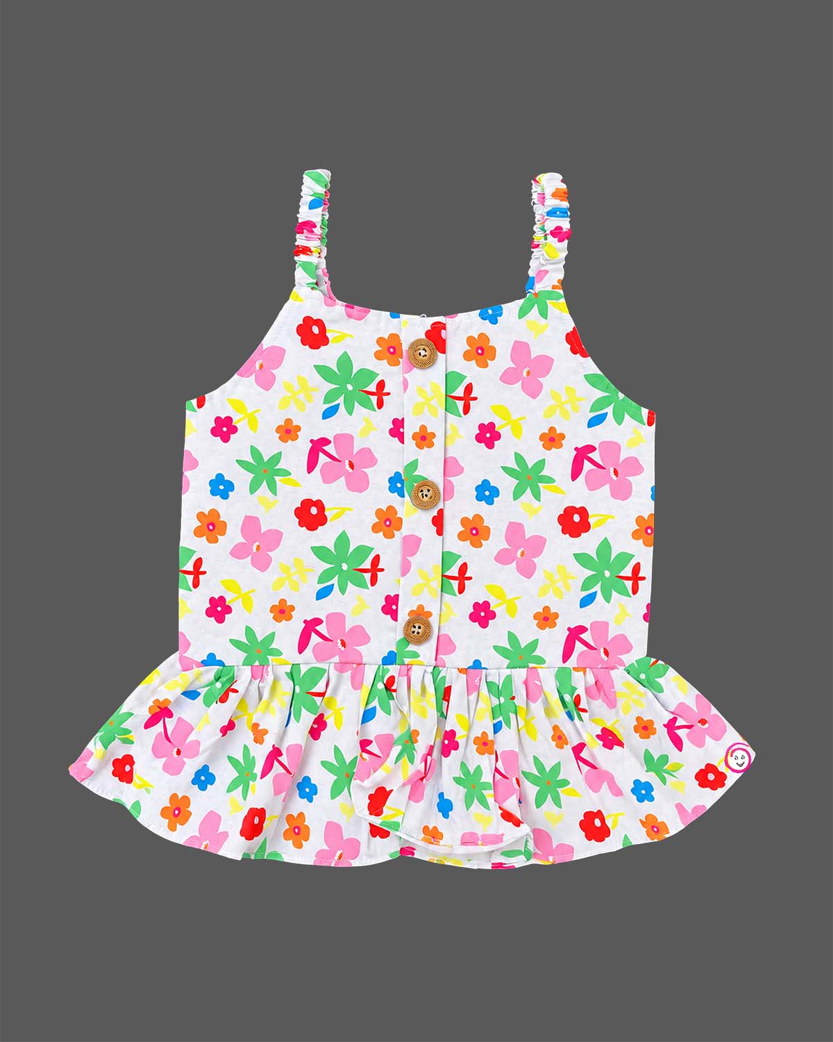 Girls floral peplum camisole top with front buttons and elasticated waist shorts featuring utility pockets.