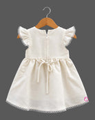 Frill sleeve organic frock with embroidered yoke and casual frock styling details.