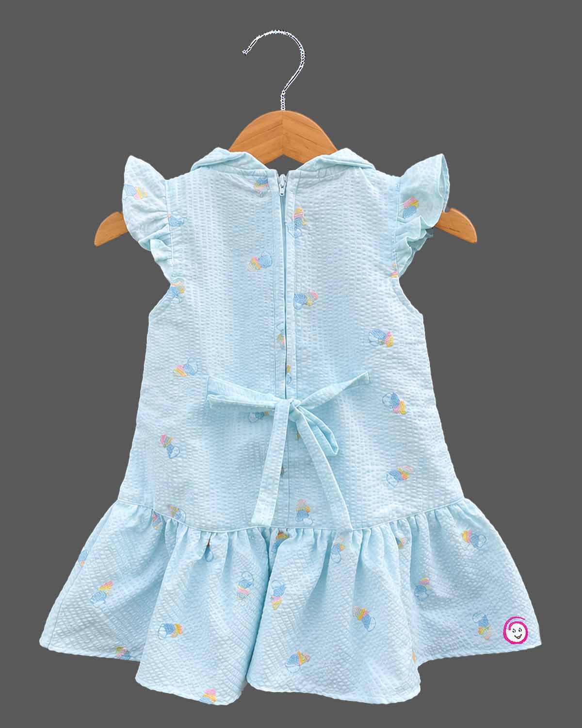 Infant casual frock featuring a collar neck  front buttons, and casual wear for baby girl style