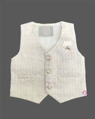 Boys textured linen waistcoat set featuring a collared shirt, matching bowtie, and tailored trousers.