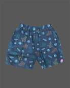 Young prince wearing space rocket patterned Cuban collar button shirt with matching elastic waistband shorts ensemble.