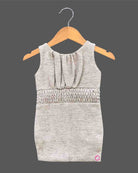 Baby girl shimmer jacket midi dress with floral brooch appliqué for birthday parties and festive celebrations.