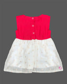 Sleeveless traditional festive attire for toddlers featuring an embroidered central emblem and a voluminous flared skirt.
