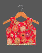 Girls floral embroidered sleeveless choli paired with a tiered ruffled skirt and tassel drawstring accent.