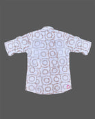 Trendy toddler boys ethnic ensemble featuring circular patterned tunic style top with button placket