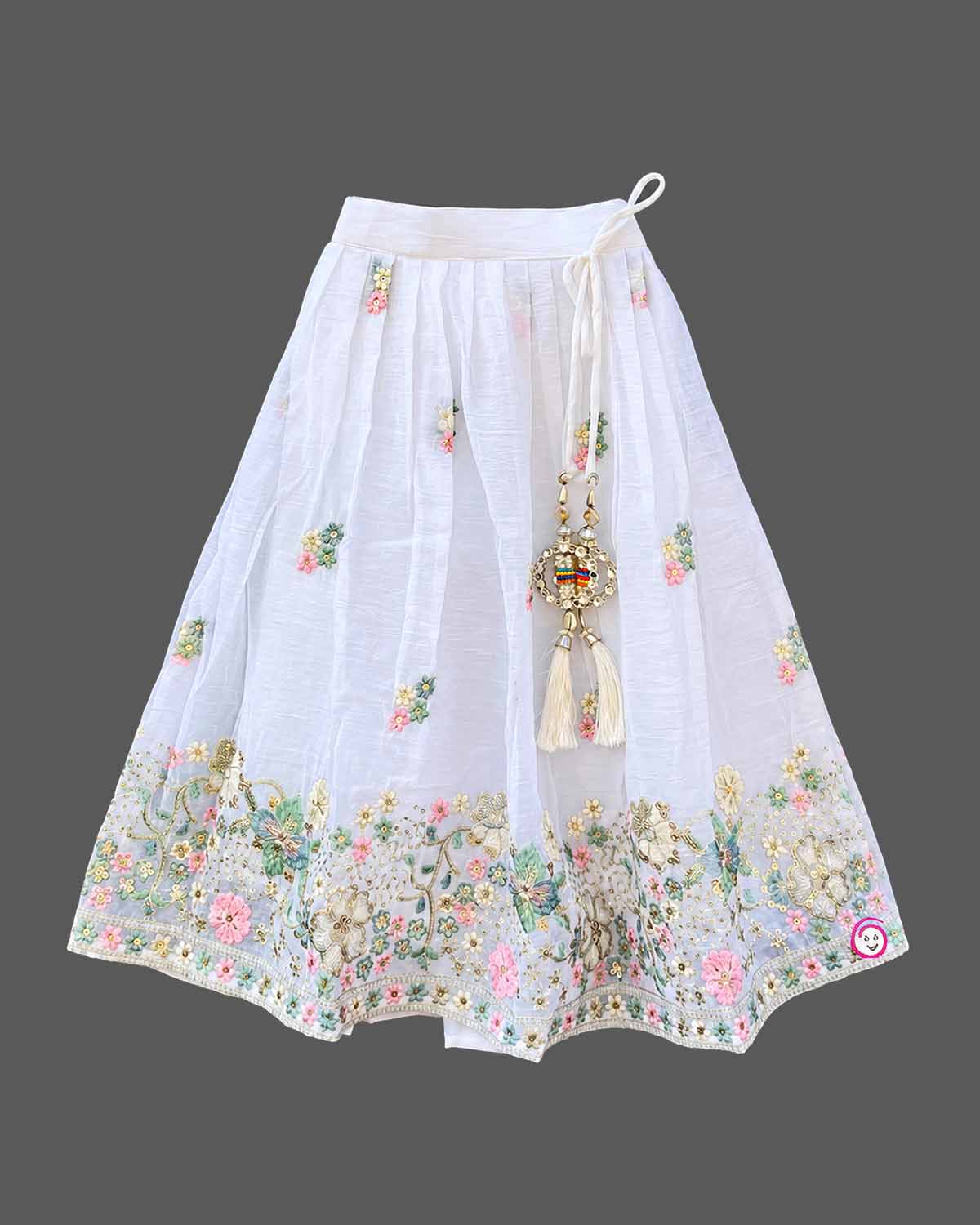 Hand-embroidered lehenga choli for kids with sleeveless choli, flared skirt, and dupatta.