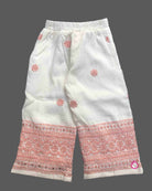Baby girl embroidered cotton top and pant set featuring shoulder straps and matching wide leg pants for festive occasions