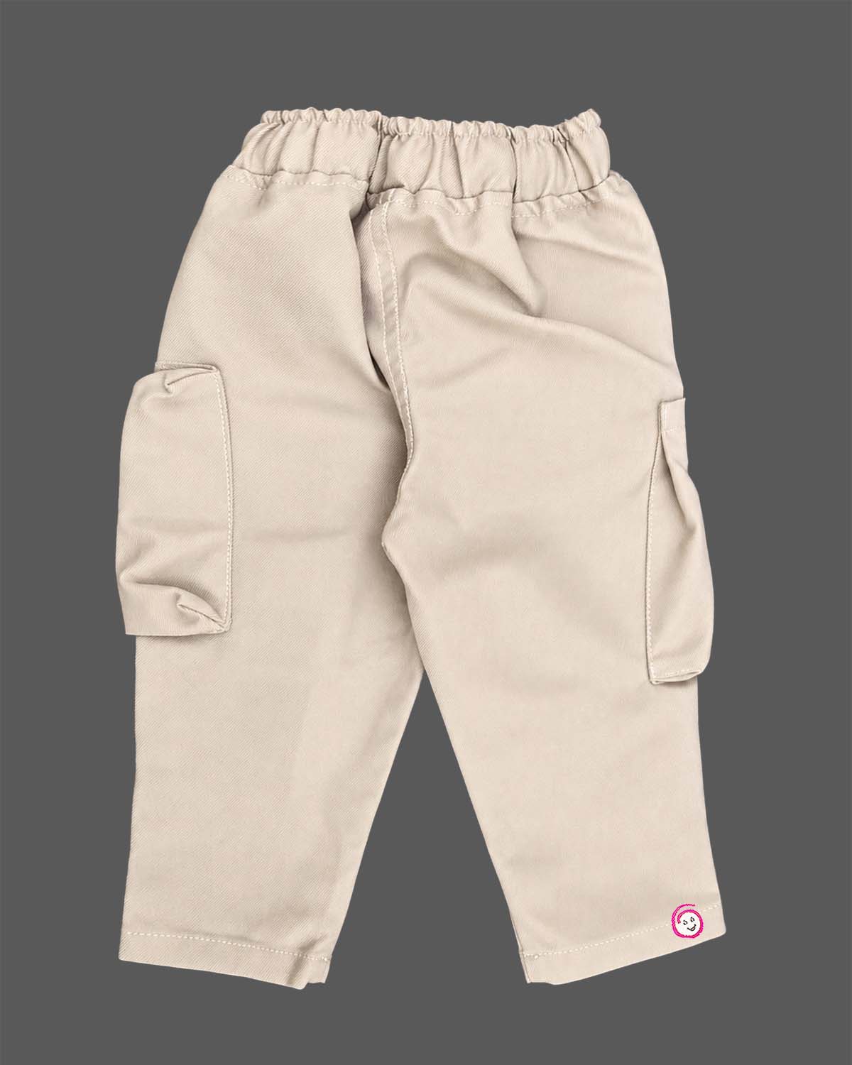 Casual utility cargo pants for little gentleman detailed with contrast stitching panels, large side flap pockets, and a patterned rope drawstring.