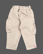 Casual utility cargo pants for little gentleman detailed with contrast stitching panels, large side flap pockets, and a patterned rope drawstring.
