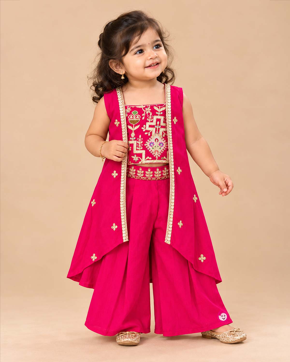 Zari embroidered kids palazzo set featuring a sleeveless long jacket and pleated palazzo pants